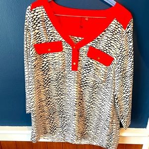 Red and white silky blouse